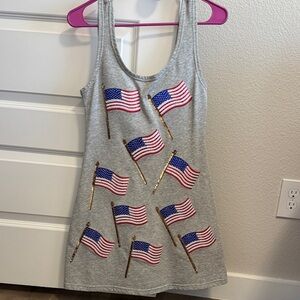QUEEN OF SPARKLES Gray Dress with Blue and Red flags.